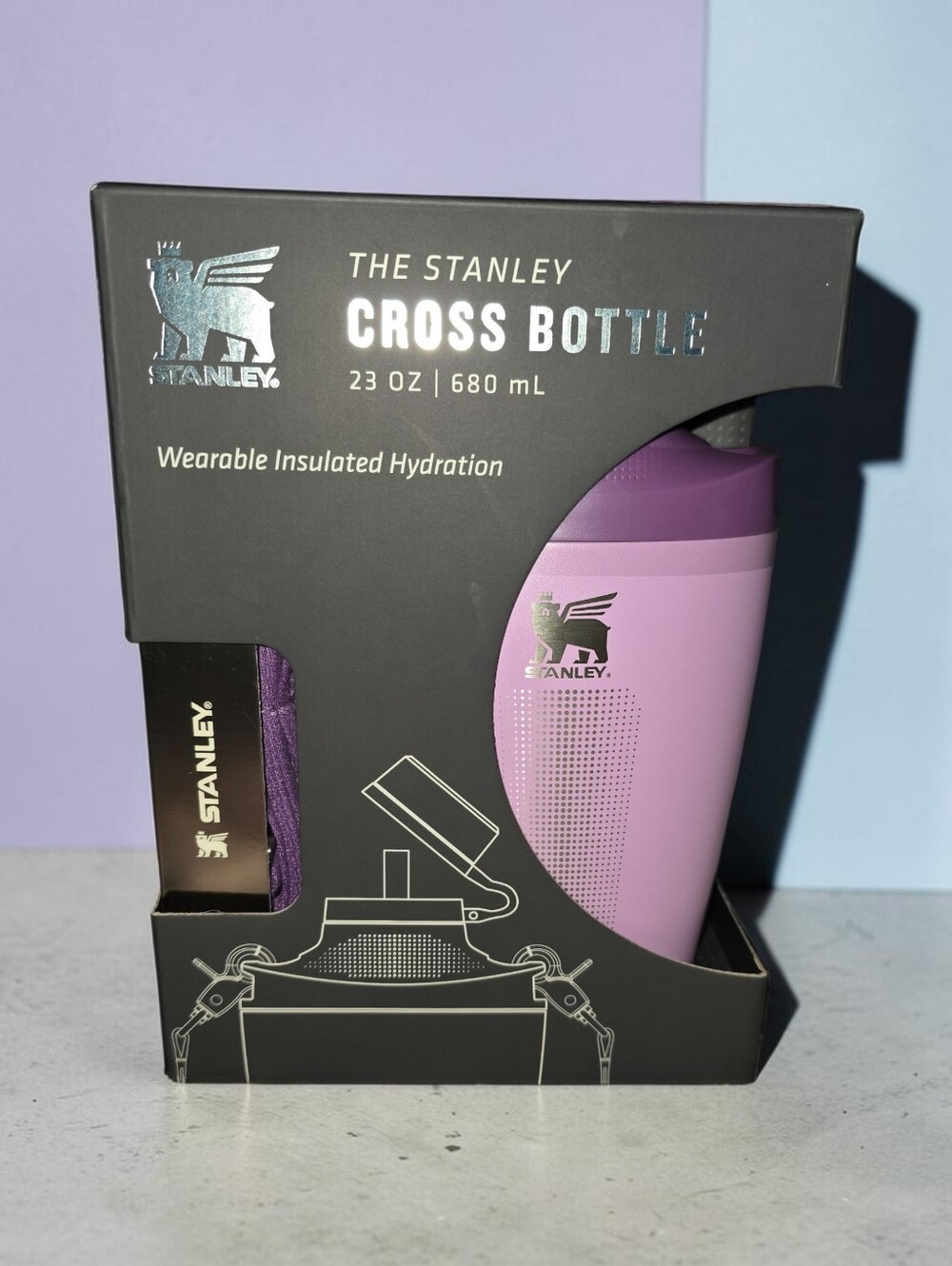 23 Oz Stanley Cross Bottle in Lilac features a jacquard crossbody strap